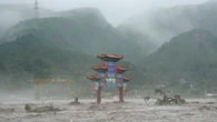 Thousands evacuated as Beijing flooding kills at least 20, leaves 27 others missing