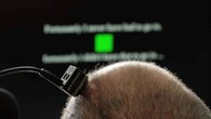 Paralyzed man speaks and sings with AI brain-computer interface