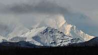 Alaskan rescue crews search for 2 overdue climbers at site of avalanche