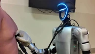 Humanoid robot performs medical procedures via remote control