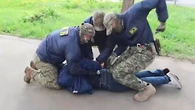 Russian protester jailed 15 years for $500 Ukraine donation, curses Putin in court