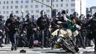Los Angeles riot and protests put some NFL caliber tackles on display: WATCH