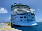 Why are cruise ships registered in other countries?