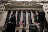 Wall Street returns to record heights as yields ease