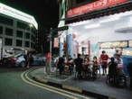A savory stroll under the neon lights of Singapore