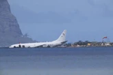 Dive teams right coral damaged by plane in Kaneohe Bay