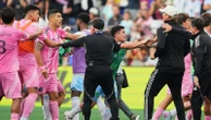 Football star Luis Suarez apologises for spitting at rival team's staff member