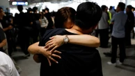 Hundreds of South Koreans arrive home after US immigration raid