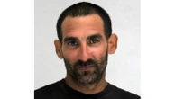 Man accused of beheading motel manager after washing machine row