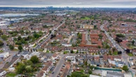 Two arrested as police suspect 'corrupt' council staff allocated 'hundreds of homes for cash'