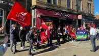 Pizza Hut franchisee accused of 'wage theft' as workers stage protest