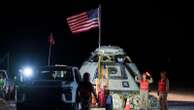 Troubled spacecraft lands back on Earth - but leaves astronauts behind