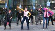 Climate activists stage protest dancing to Stayin' Alive by Bee Gees