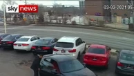 Employee clings to bonnet in car theft