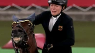 Coach kicked out of Olympics after she punched horse that refused to jump