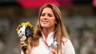 Polish Olympian auctions silver medal to pay for baby's lifesaving heart surgery