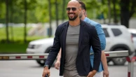 Andrew Tate says he can leave Romania while awaiting trial
