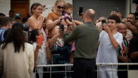 Prince William wins hearts as he cuddles baby handed to him on Brazilian island