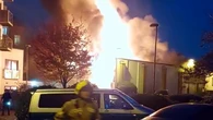 Around 100 firefighters tackle large blaze which engulfed shop
