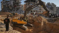 Israel allows Red Cross and Egyptian teams into Gaza as search for bodies of hostages widens