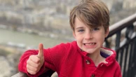 Boy, 8, killed in Catholic school shooting named - as victim's father brands attacker 'a coward'