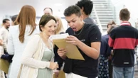 Thousands of children celebrate their GCSE results - with gender gap persisting