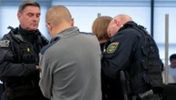 Former assistant to far-right politician on trial over Chinese spy charges