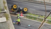 Man seriously injured after tractor falls off bridge on to motorway