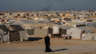 Young British girl returns to UK from IS detention camp in Syria, authorities say