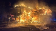 Homes evacuated as firefighters tackle huge blaze in seaside town