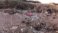 Lorries dumped waste on beach - as experts reveal gangs can 'make millions' from illegal tipping