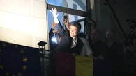Romania's new president looks like he's enjoying life after a campaign of rancour and division
