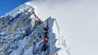 Mount Everest suffers traffic jams as climbers battle harsh weather - with beginners not helping