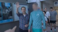 'I'm warning you now, move!' Tube fare dodgers and Robert Jenrick clash - as he chases them for video
