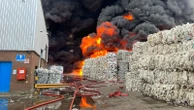 Firefighters battling large blaze at recycling warehouse