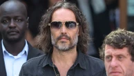 Russell Brand arrives at court for plea hearing