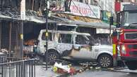 Flats catch fire after car rammed into Birmingham shop in suspected arson attack