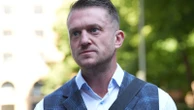 Police investigate assault as video appears to show Tommy Robinson at station