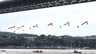 Ten Greenpeace activists arrested after suspending themselves from bridge