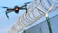 Drones are sending 'overwhelming amounts' of drugs into prisons - and could help inmates escape, report warns
