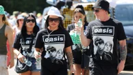 'It's a cultural moment': Oasis fans queue all day for Manchester homecoming gig