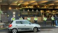 Police attend protest outside London hotel which 'will be housing asylum seekers'