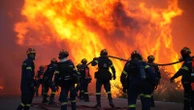 Major wildfire on Greek island prompts evacuations - as officials warn 'situation remains critical'