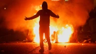 Baton rounds, firebombs and water cannon as families flee 'locals' venting their feelings