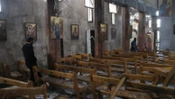 22 killed after suicide bomber opens fire at church - and then detonates explosive vest