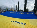 В Анкориджі проходить масштабний мітинг проти російської агресії напередодні зустрічі Трампа та путіна