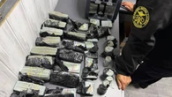 Жінка намагалась вивезти з України майже мільйон доларів готівки під капотом авто