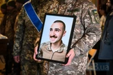 У Києві провели в останню путь загиблого на війні фотографа та військового Костянтина Гузенка