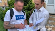 Киянин отримав підозру за те, що приставив пістолет до голови іншого водія під час конфлікту на парковці
