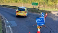 Two men die and five others seriously injured in roundabout crash